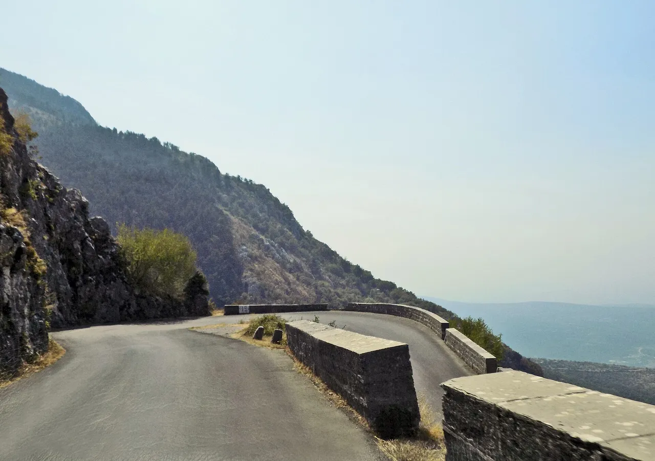 The R-1 regional road in Montenegro winding up the mountainside above the coast