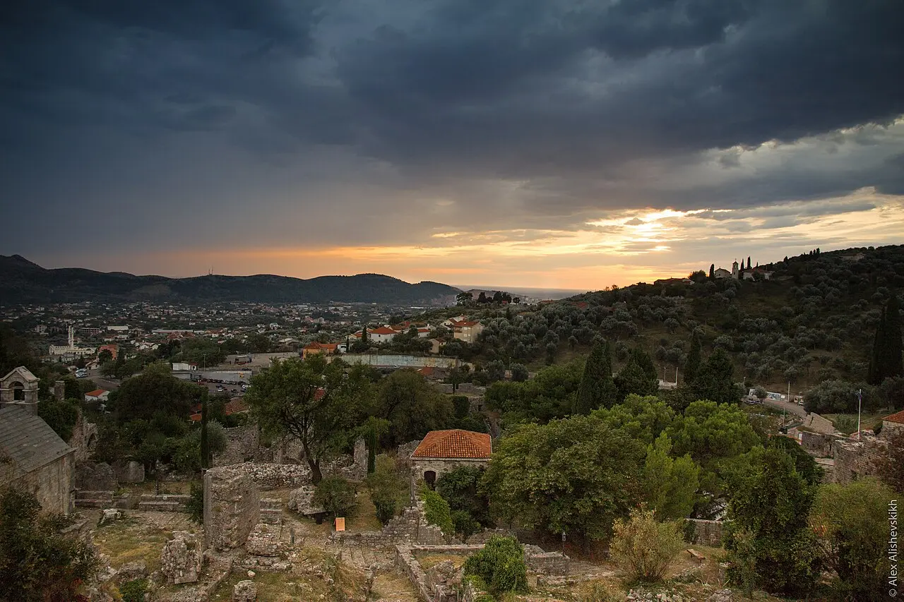Sunset over the ruins of Stari Bar looking down across olive groves toward the coast