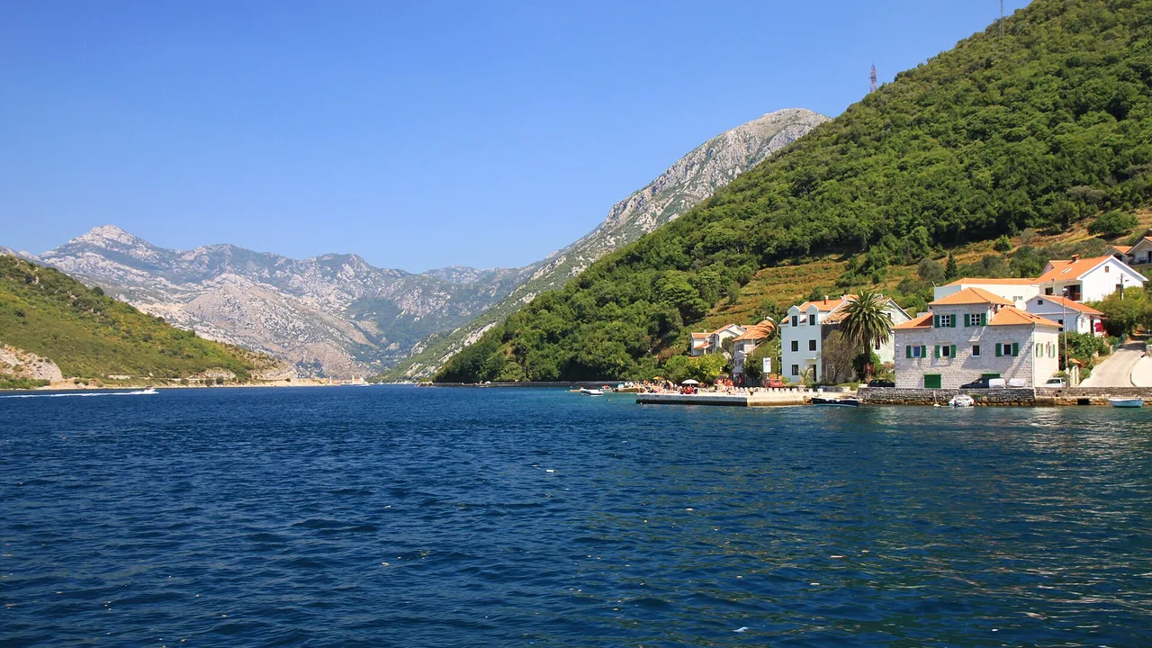 Verige Strait in the Bay of Kotor with the village of Lepetane on the shore - a 6-knot zone
