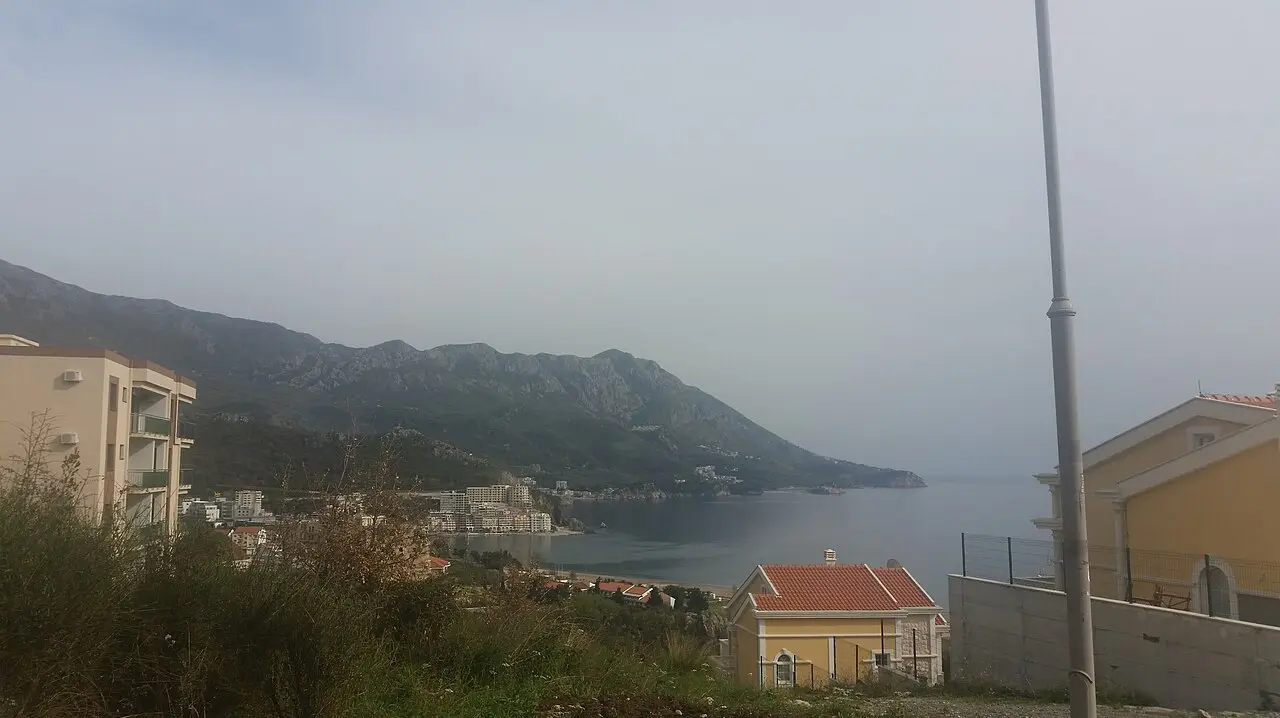 Bečići beach and resort hotels under the mountains on the Budva Riviera, Montenegro