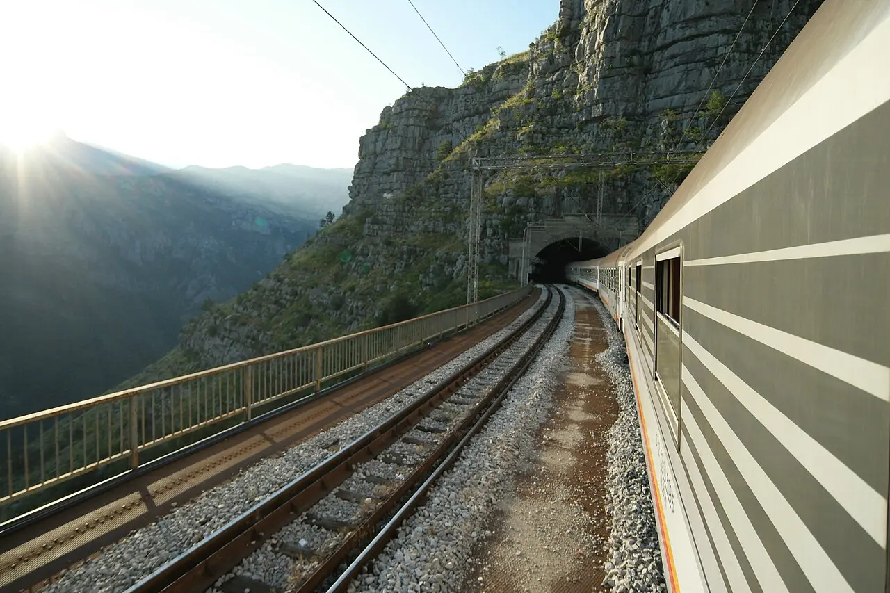 Passenger train on the Belgrade-Bar railway passing Lutovo in the Montenegrin mountains