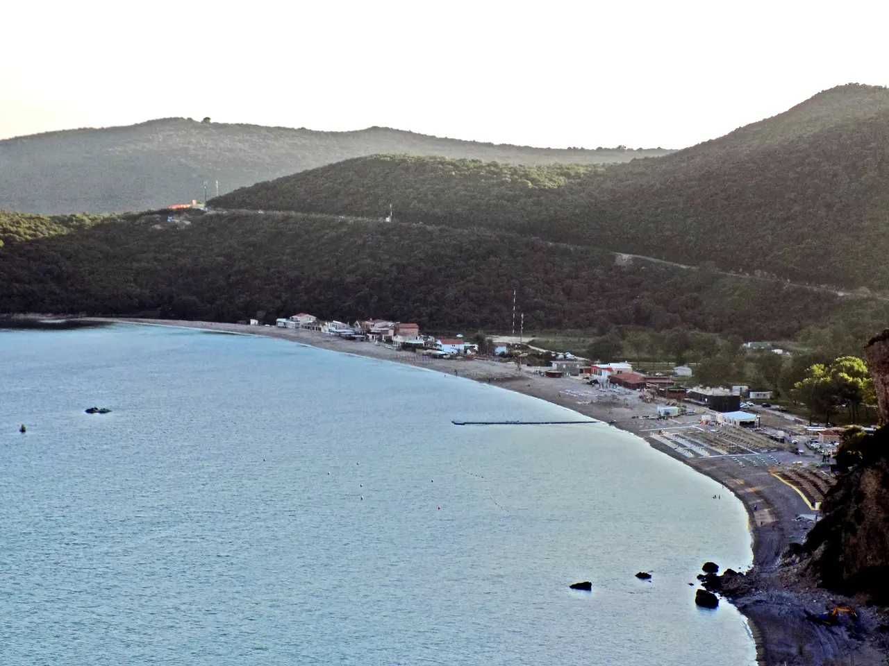 The wide green bay and long beach of Jaz, northwest of Budva, Montenegro