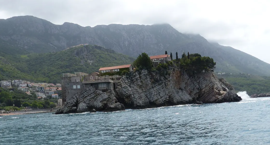 The islet resort of Sveti Stefan connected to the Montenegrin coast by a narrow isthmus