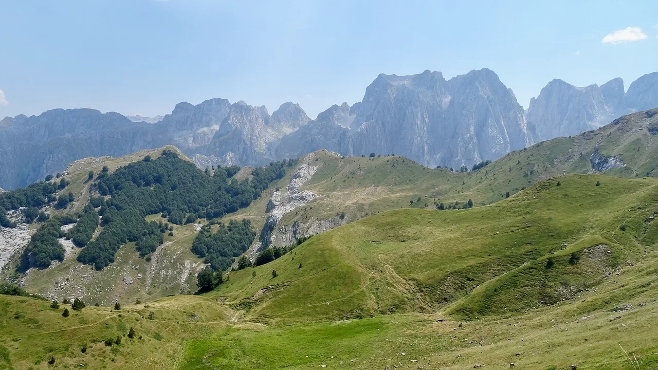 The Karanfil massif and green mountain pastures in Prokletije above the Grebaje valley, Montenegro