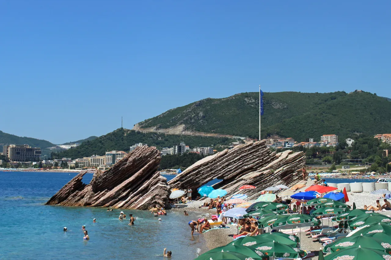 Adriatic beach and clear sea at Rafailovići on the Budva Riviera in summer