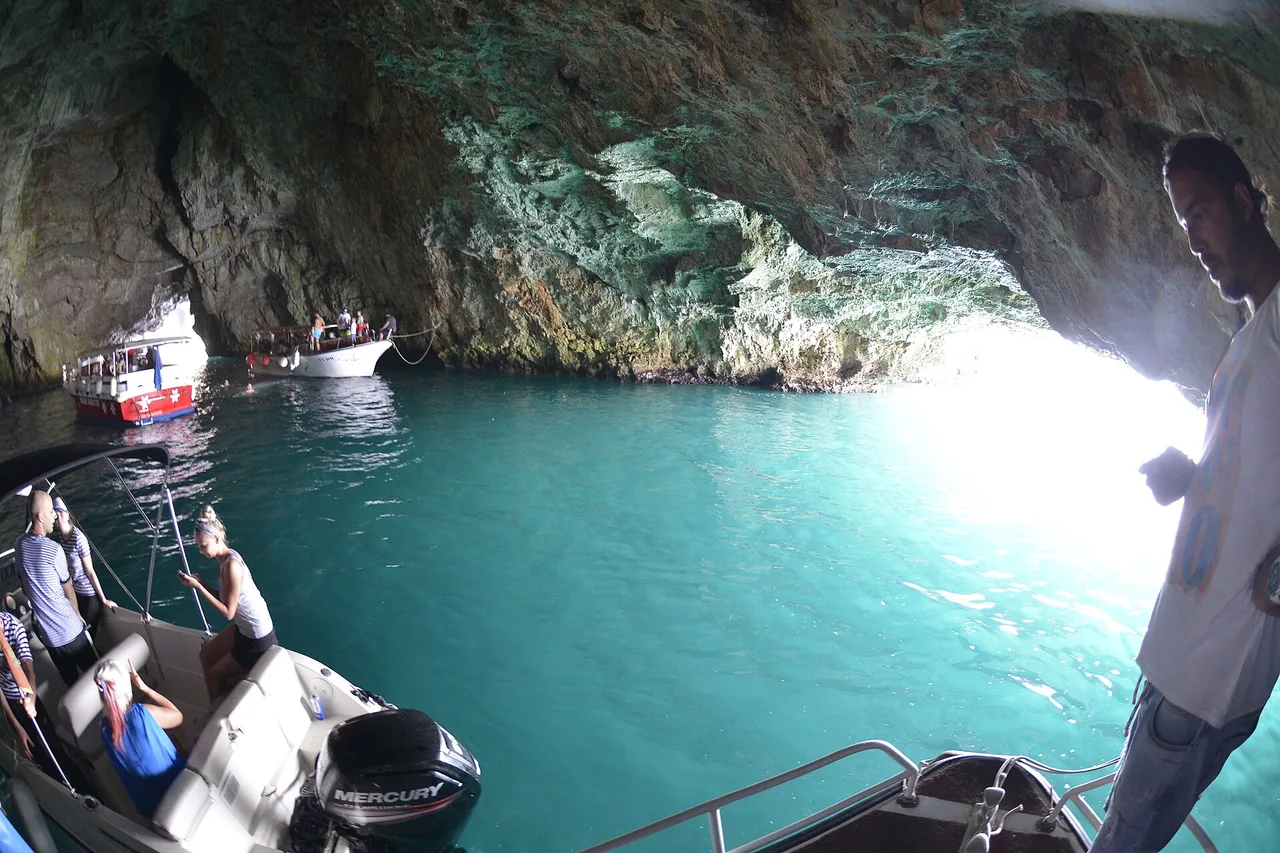 The glowing blue water inside the Blue Cave (Plava Spilja) on the Lustica peninsula, Montenegro