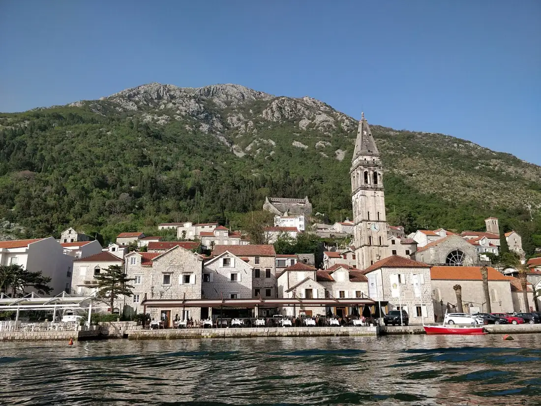 Baroque waterfront of Perast seen from a boat on the Bay of Kotor