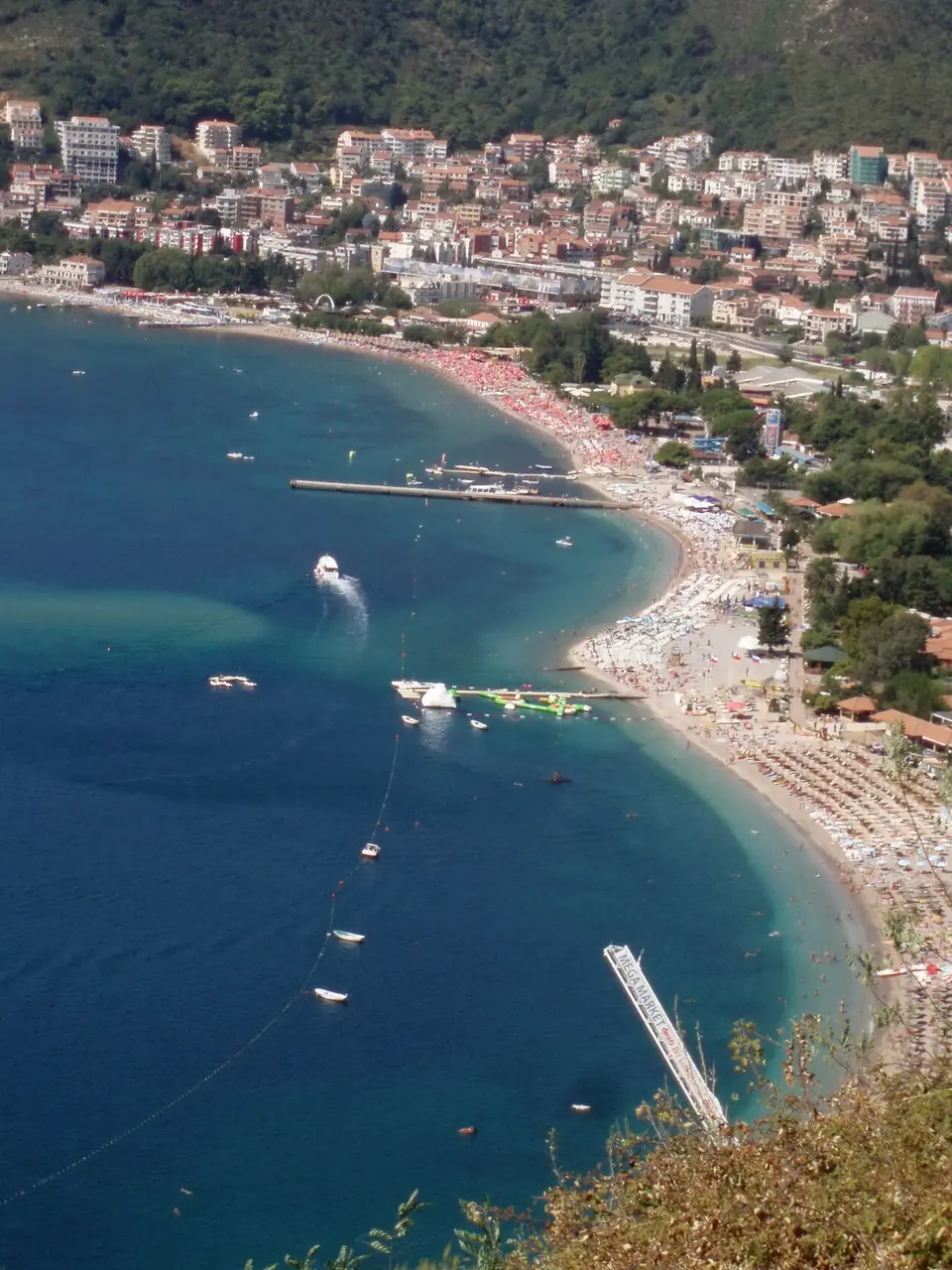 Slovenska beach, Budva's long town beach lined with loungers