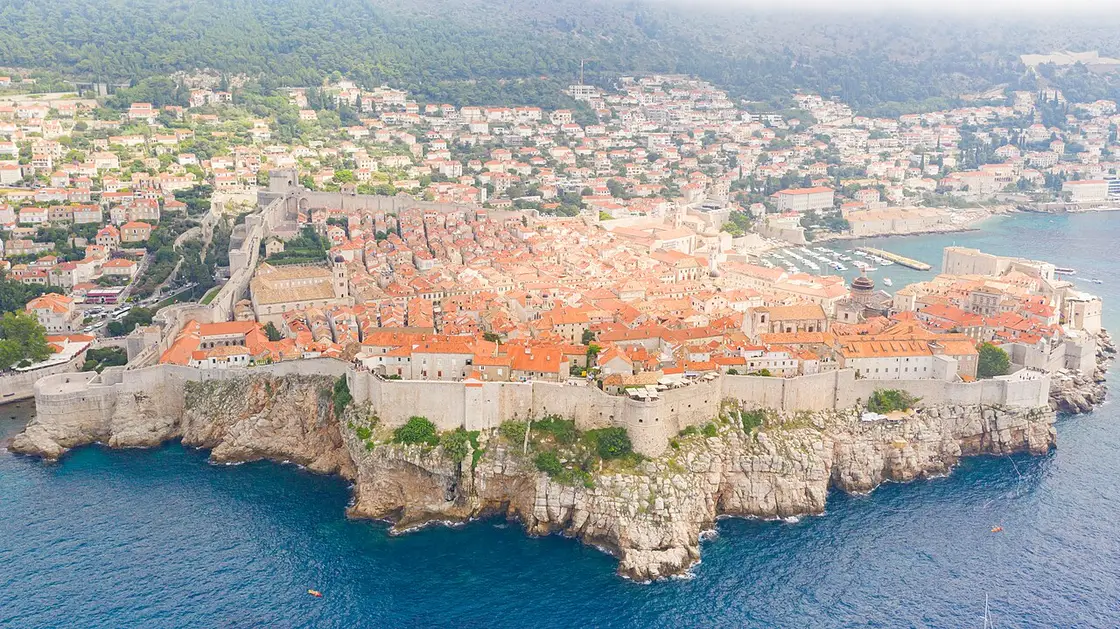 The walls and old town of Dubrovnik on the Croatian coast above the sea