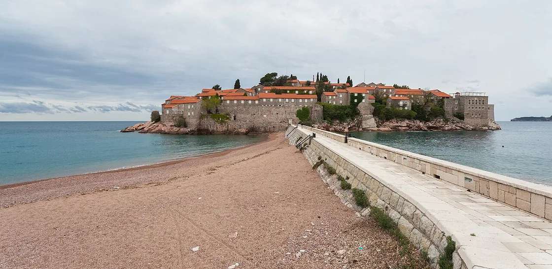 The fortified islet of Sveti Stefan linked to the shore by a slim causeway