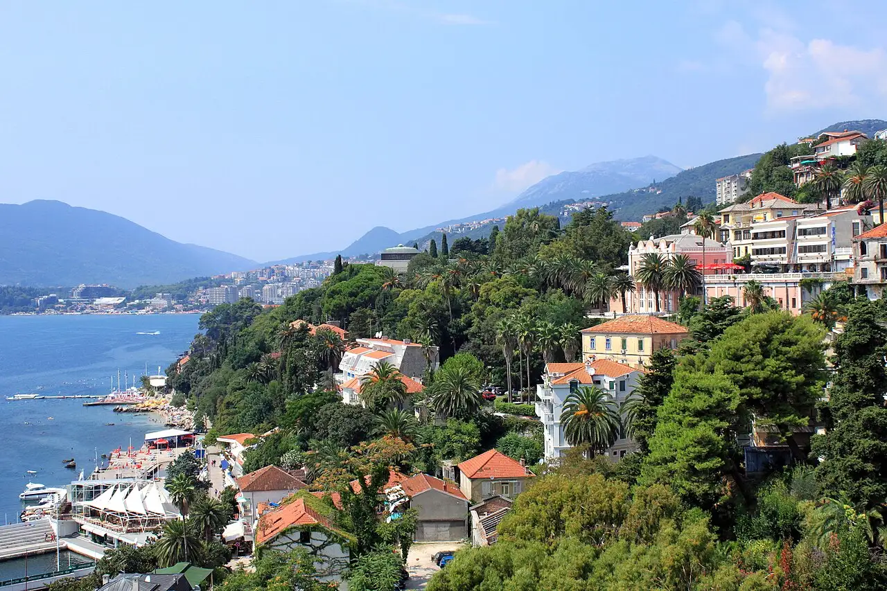 Herceg Novi cascading down to the Bay of Kotor with mountains across the water