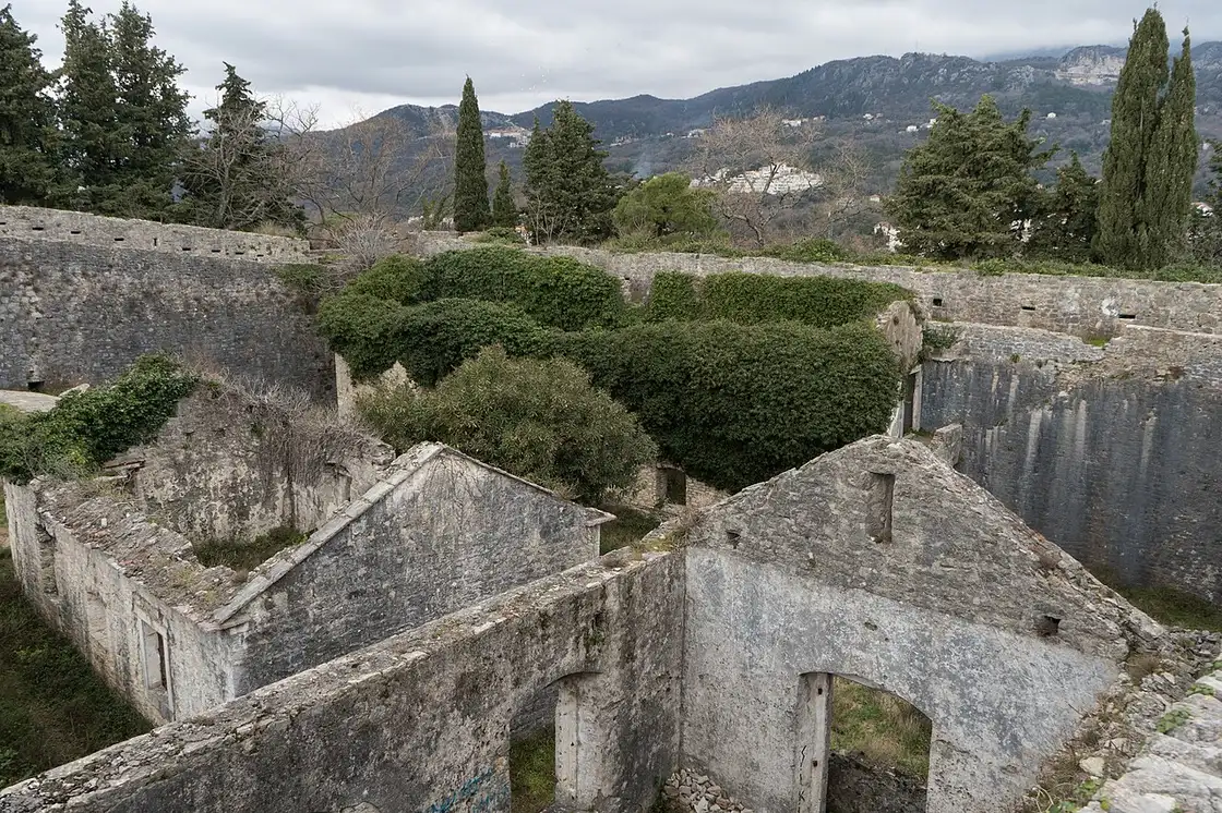 The roofless overgrown stone ruins of the Spanjola fortress on the hill above Herceg Novi