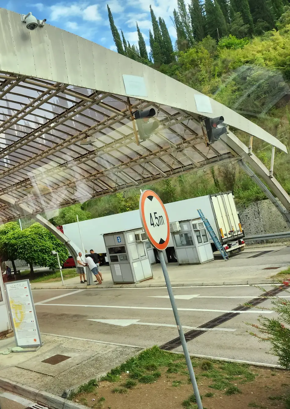 The freight lane at the Croatia-Montenegro border crossing, with control booths and a lorry