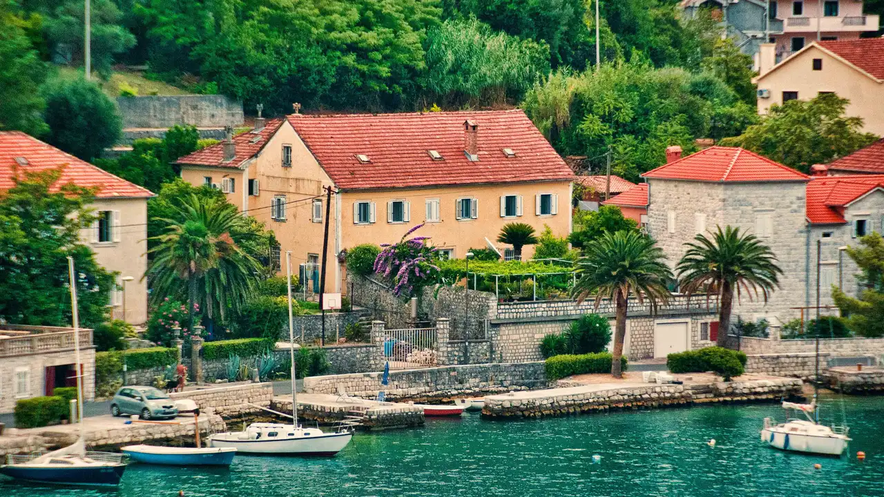 Stone houses and small boats on the Dobrota waterfront, Bay of Kotor