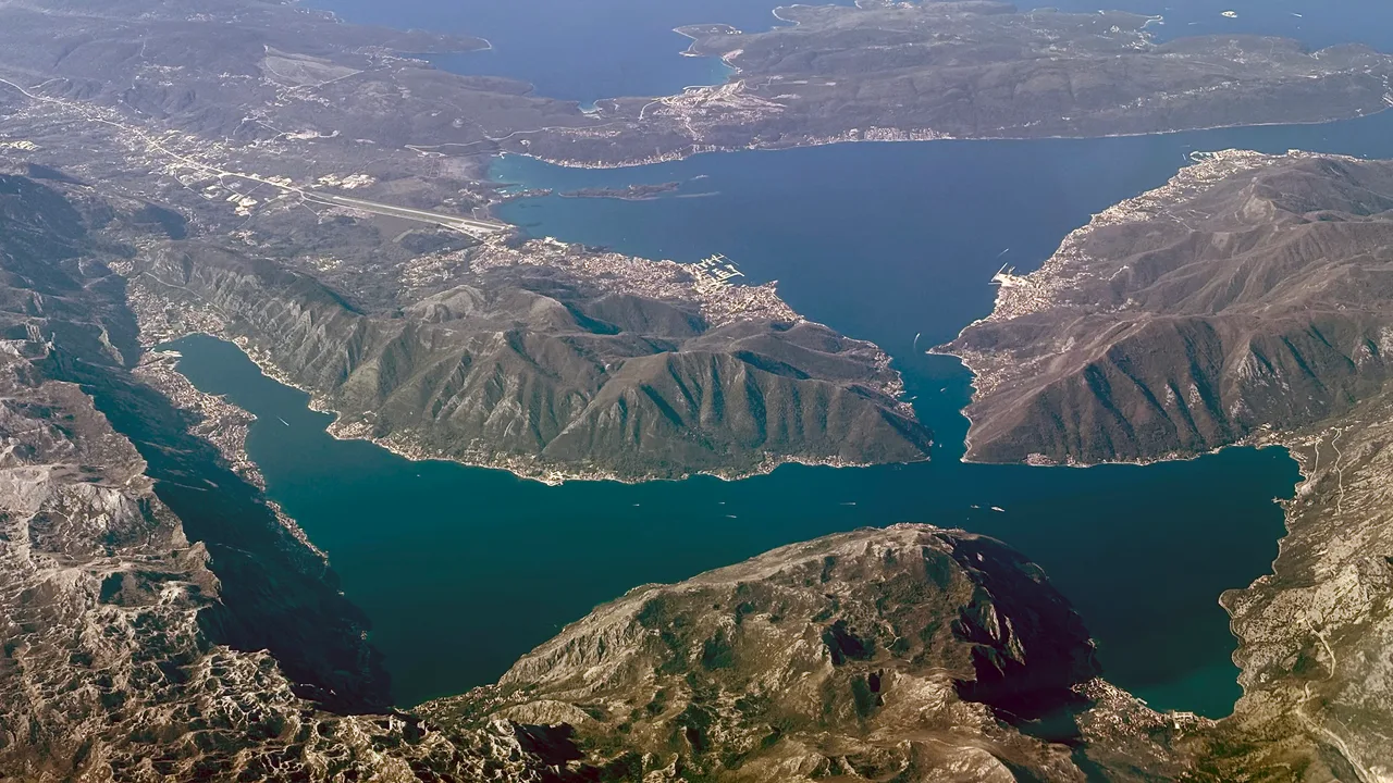 The whole Bay of Kotor seen from the air, with the Verige narrows, Tivat and the mountains of Lovcen around it