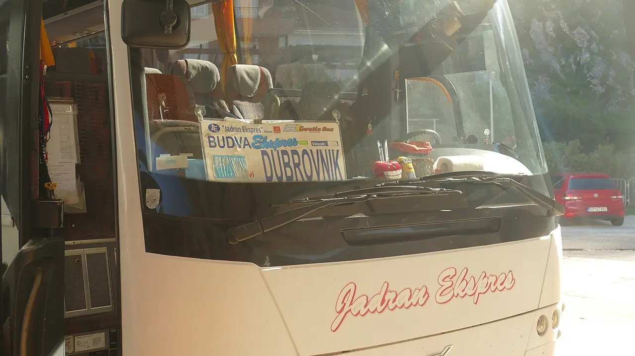 Intercity coach on the coastal road heading from Kotor toward Dubrovnik, Montenegro