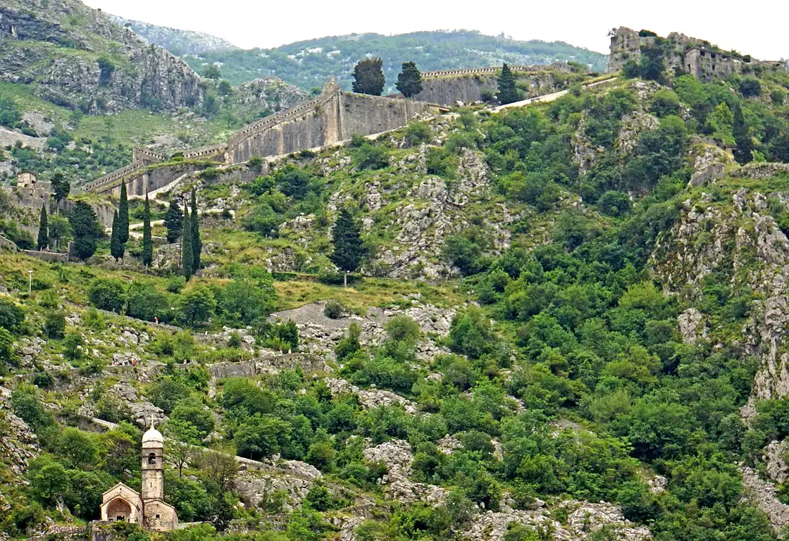 Kotor's fortification walls zig-zagging up the steep hillside above the Old Town