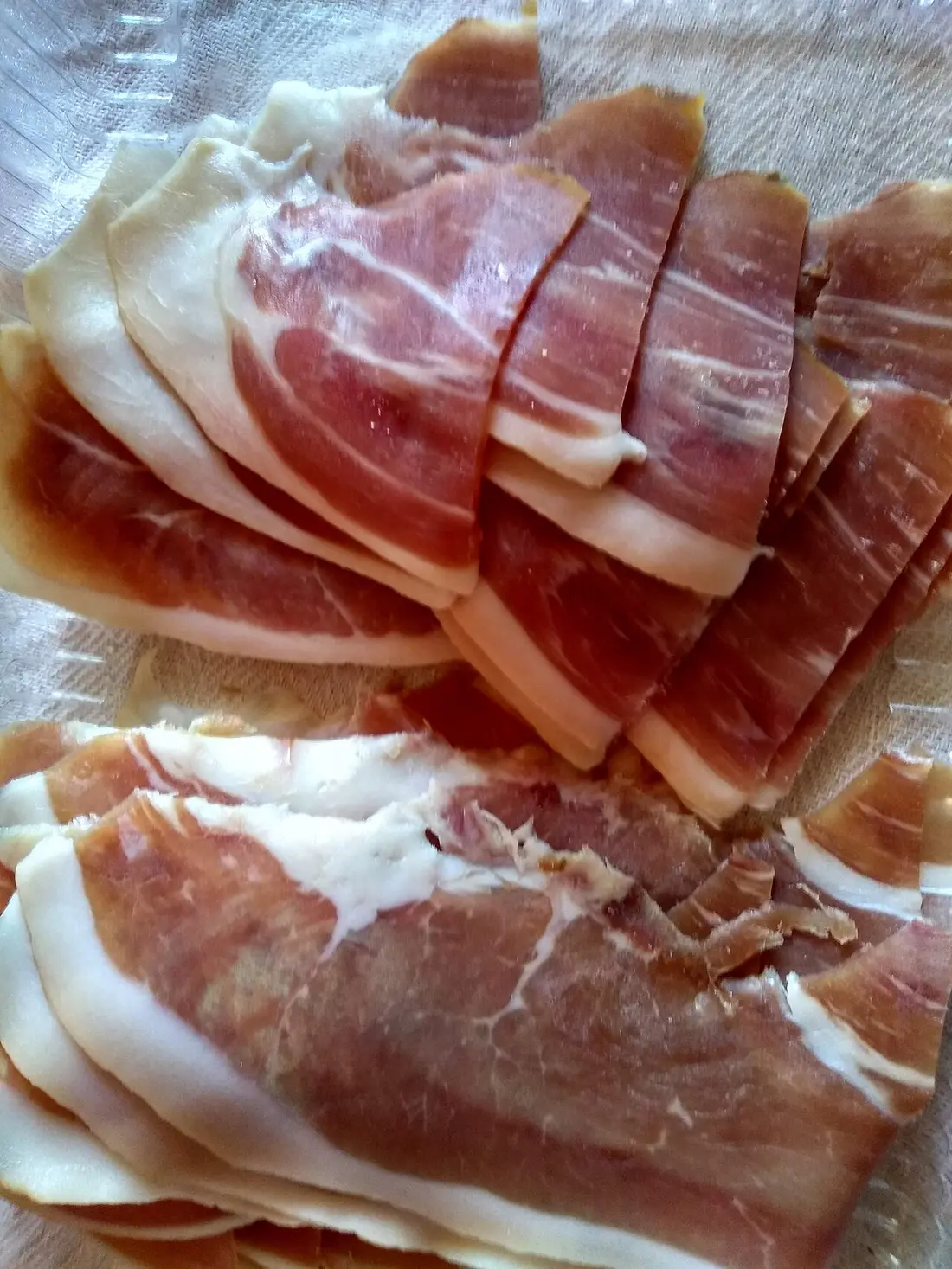 A plate of thinly sliced Njeguški pršut, the air-dried smoked prosciutto from the Lovćen village of Njeguši