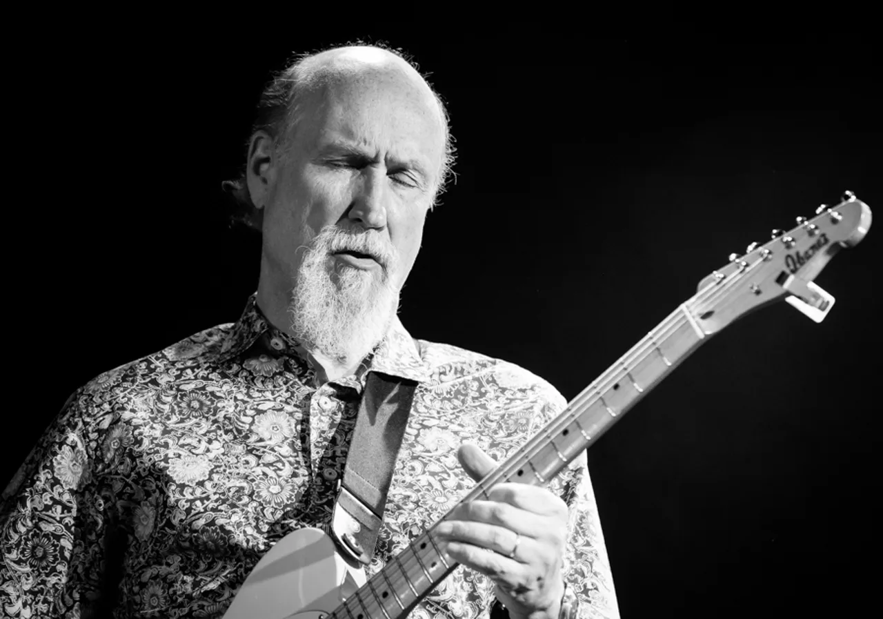 Jazz guitarist John Scofield performing on stage