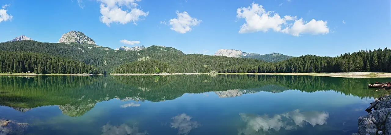 Black Lake and forested mountains in Durmitor National Park
