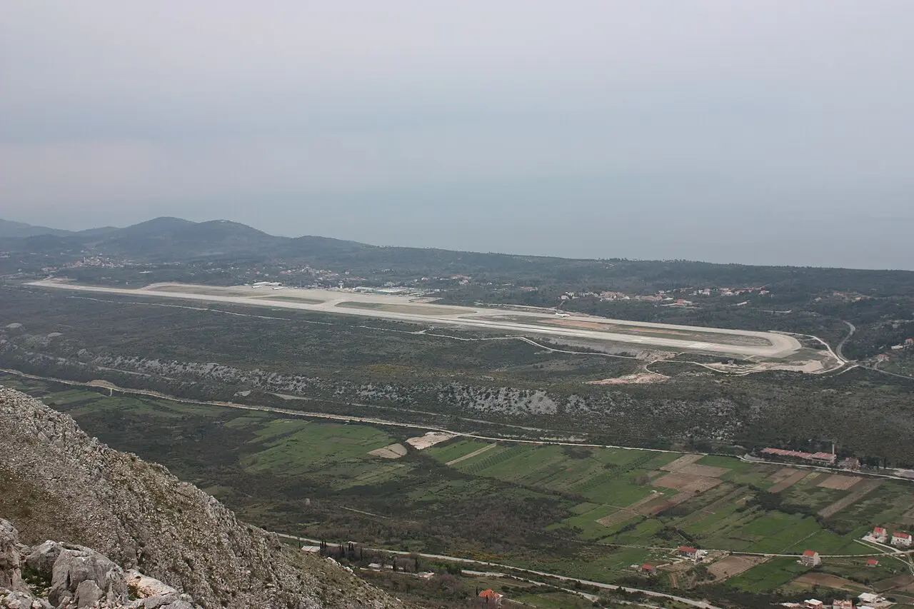 Aerial view of Dubrovnik (Čilipi) Airport runway with the Adriatic coast beyond