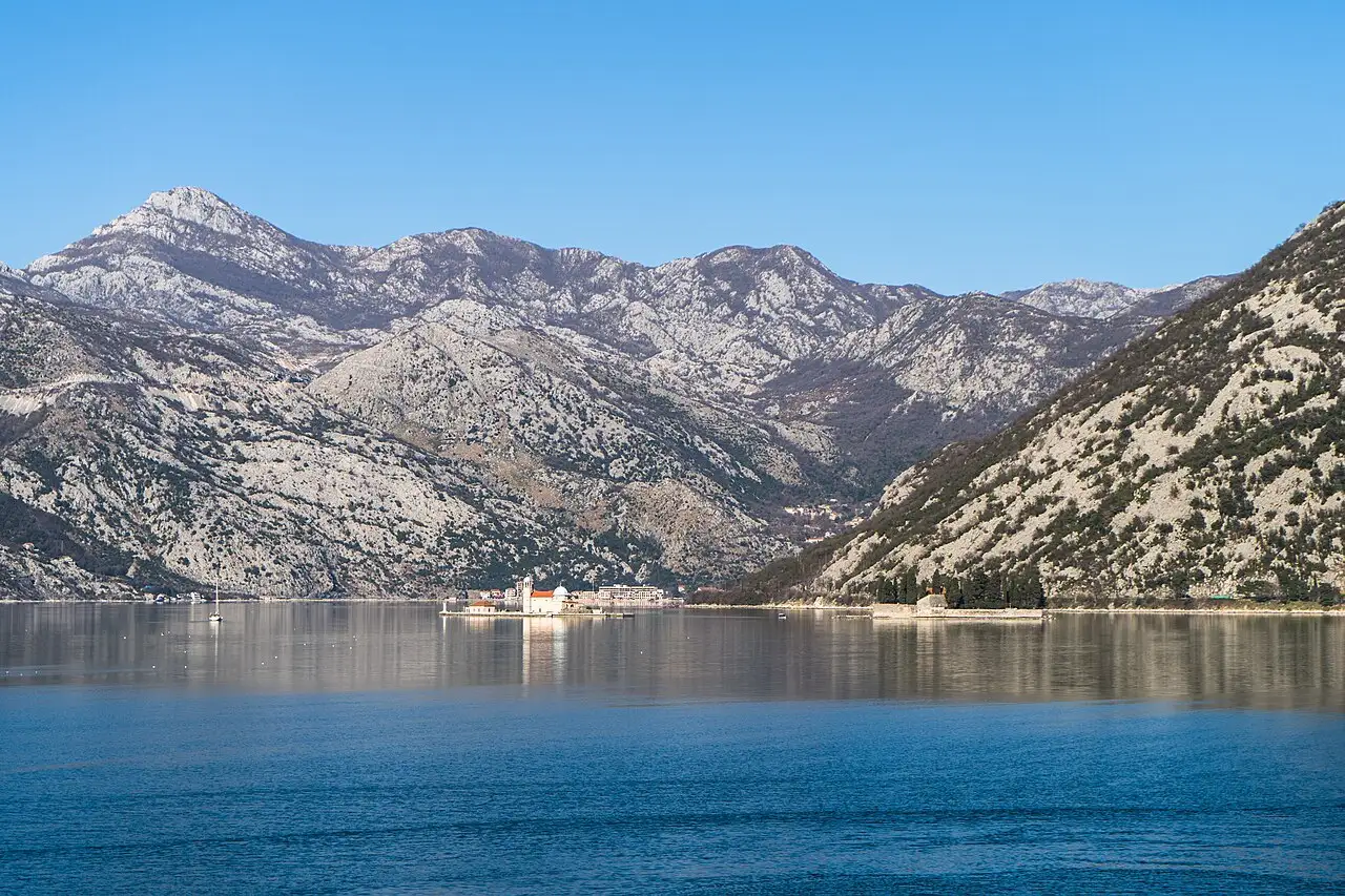 View across the Bay of Kotor to mountains and the islets off Perast in Montenegro