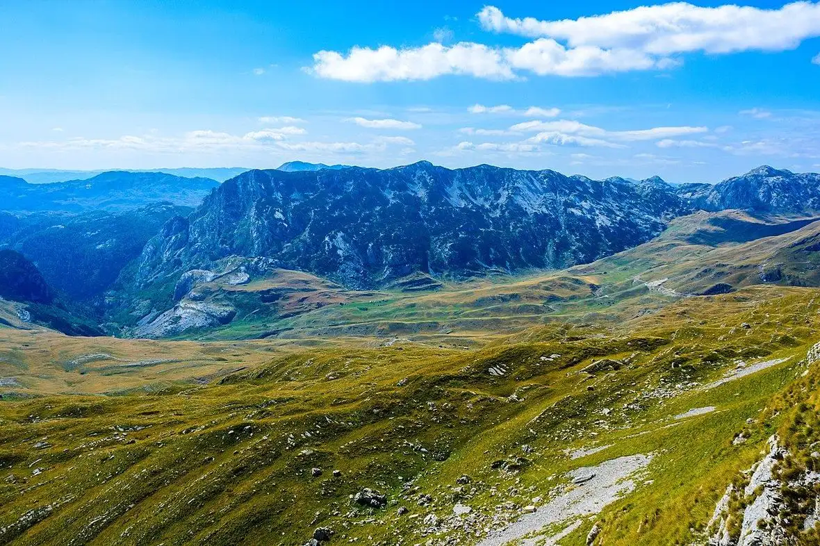 The green highland plateau and limestone ridges of Durmitor National Park in northern Montenegro