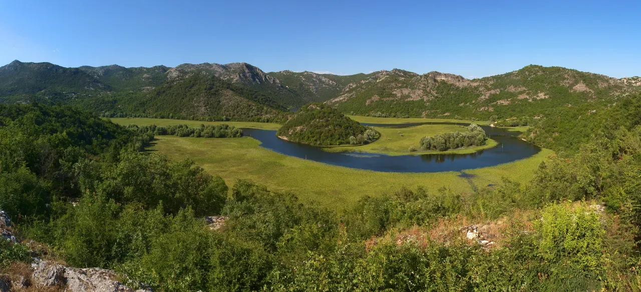 The horseshoe meander of the Rijeka Crnojevića river flowing into Lake Skadar, Montenegro