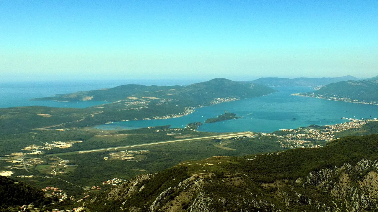 Aerial view over Tivat and its airport runway from the mountain road above the Bay of Kotor, Montenegro