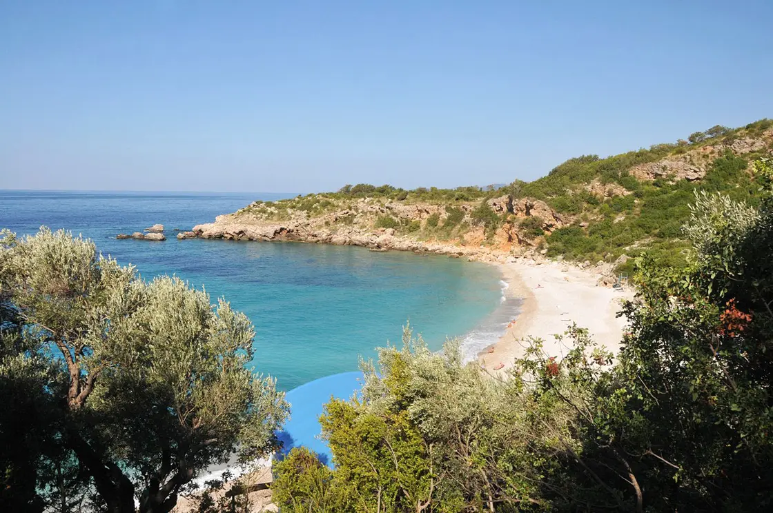 A quiet pebble cove on the Montenegrin coast with clear water