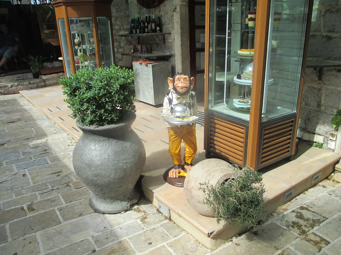 Outdoor cafe tables in the old town of Budva, Montenegro