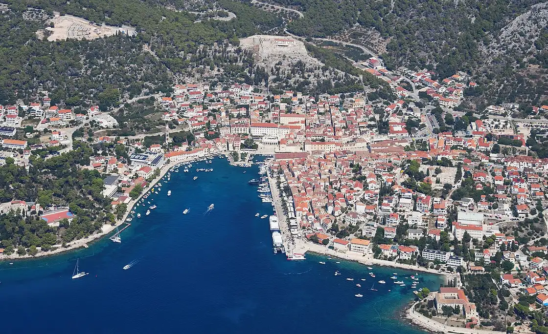 Aerial view of Hvar town and harbour on the Croatian island of Hvar, with boats in the bay