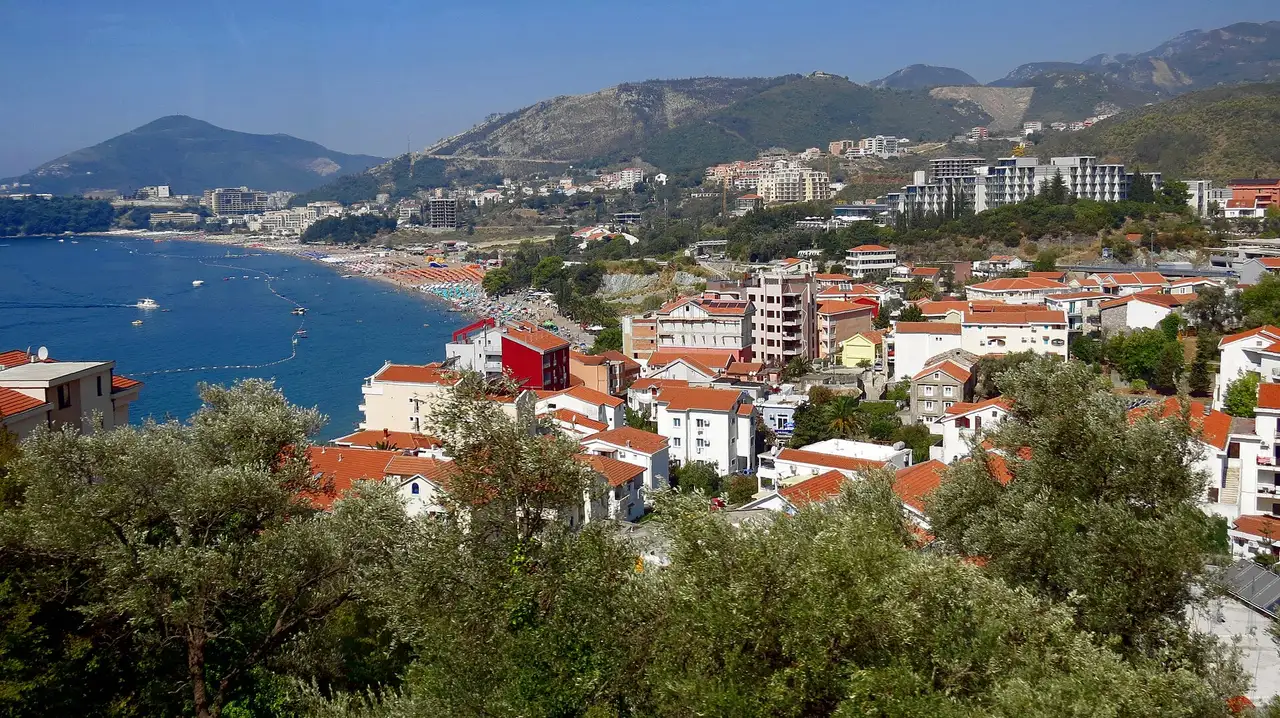 The long sandy beach at Bečići on the Budva Riviera, Montenegro, backed by hotels