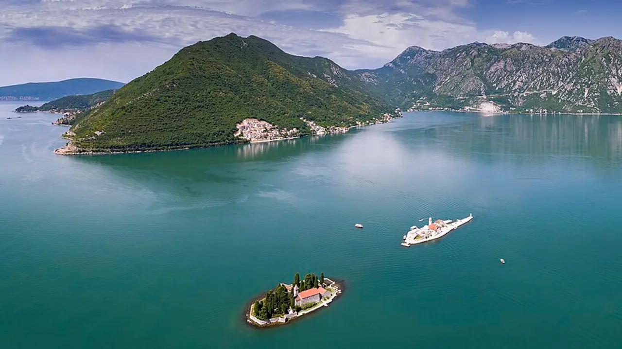 Aerial view of Perast and its two islets, Our Lady of the Rocks and St George, in the Bay of Kotor
