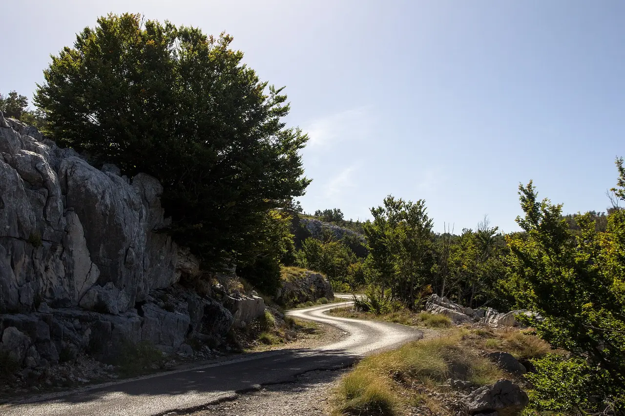 Winding road ascending toward Lovćen National Park near Cetinje, Montenegro