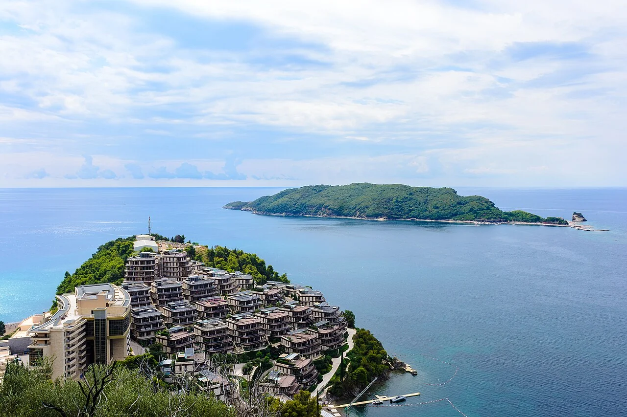 Aerial view of a resort peninsula and small island along the Budva riviera, Montenegro