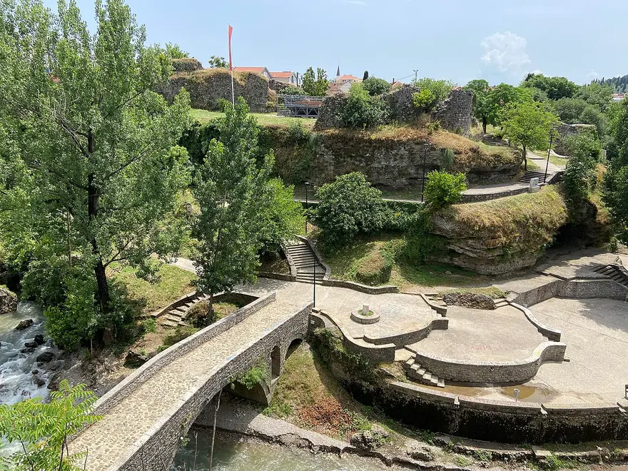Old fortress ruins and a stone bridge over the Ribnica river in Podgorica, the inland capital served by Podgorica Airport
